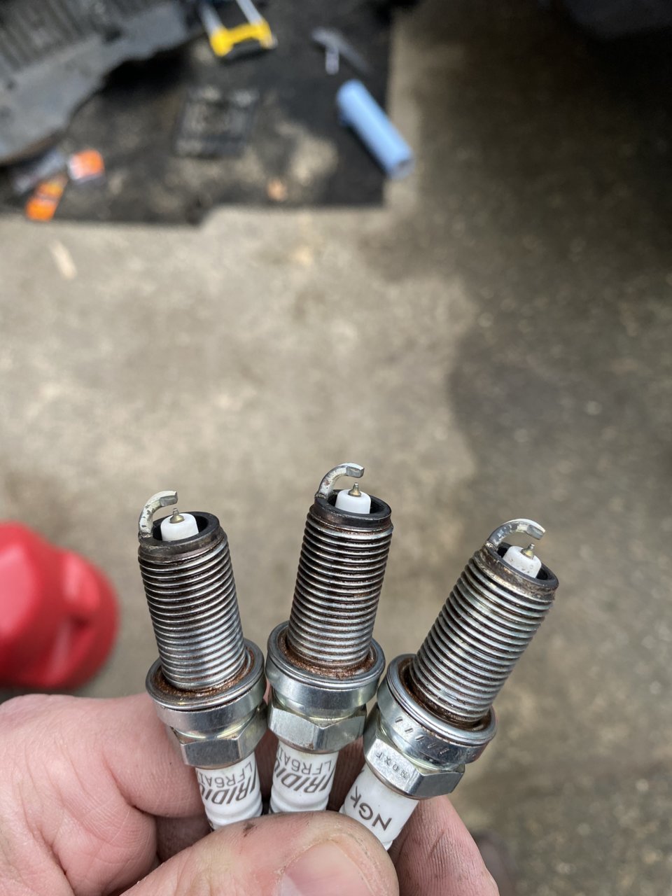 new spark plugs burnt