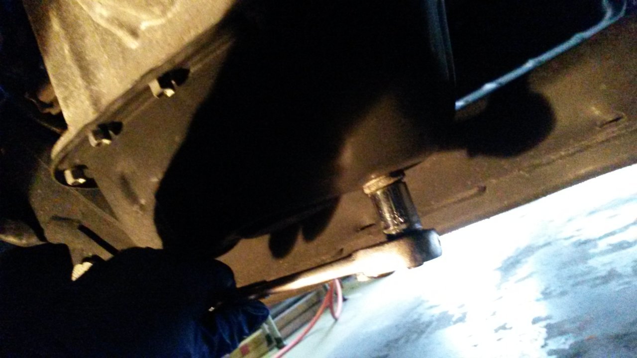 007 place drain pan and remove pan screw.jpg