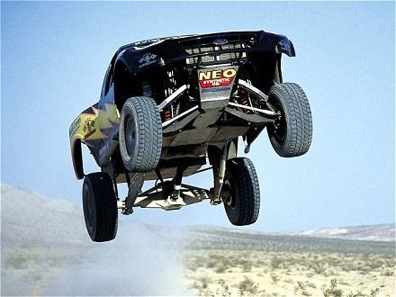 0208or_01z2000_Ford_F150_Trophy_TruckLow_Angle_Front_Shot_Truck_In_Mid_Air.217212810_std.jpg