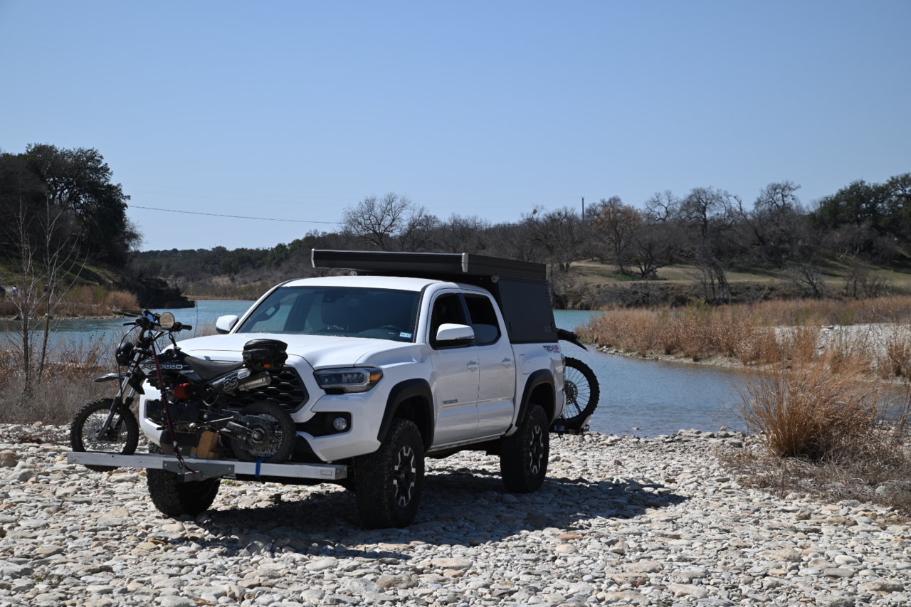 Front hitch store motorcycle carrier