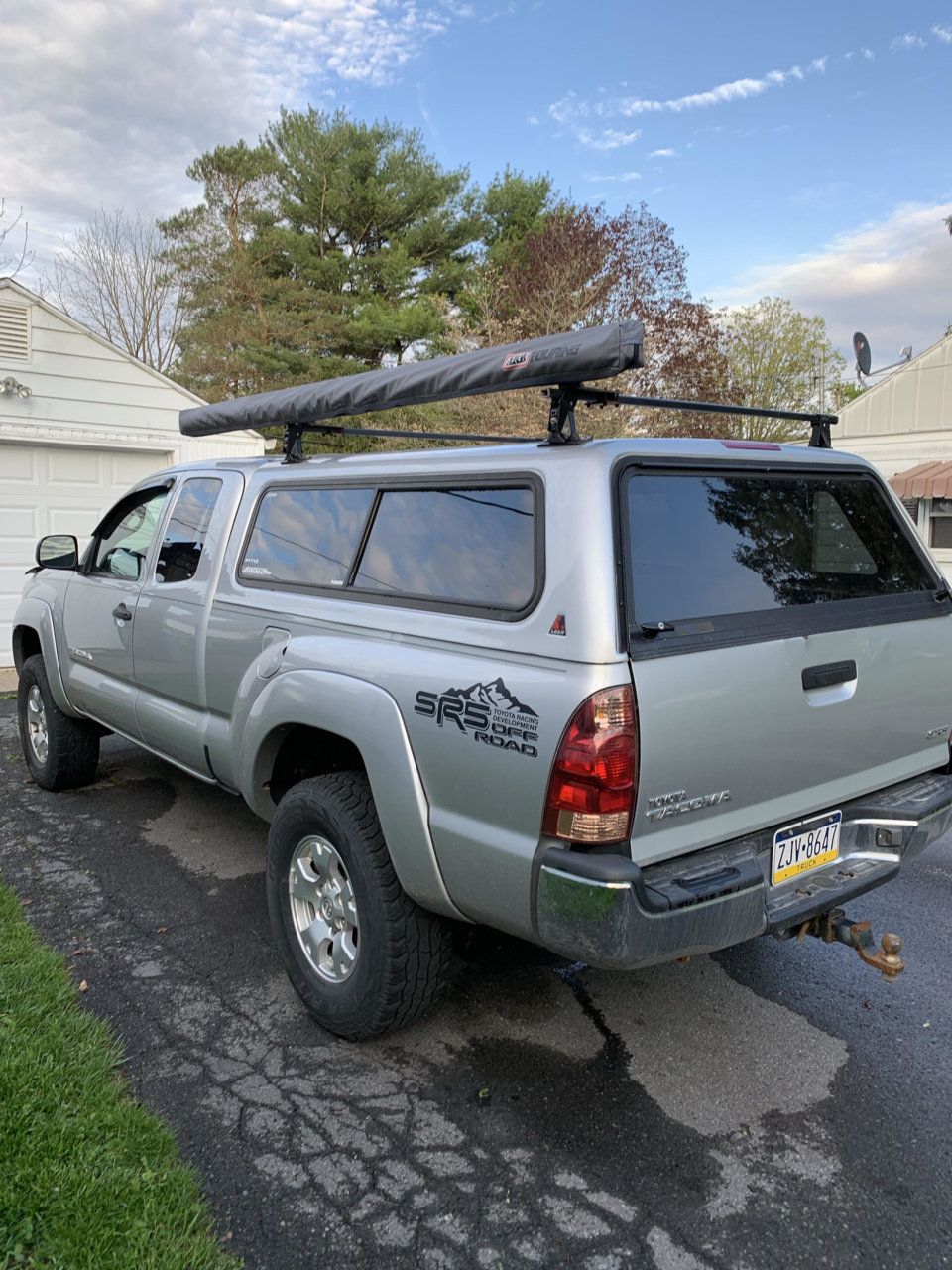 Leer Cap w thule rack and ARB awning Tacoma World