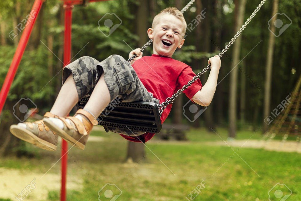 18184843-little-boy-swinging.jpg