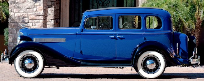 1934 Pontiac Eight 603 4-door sedan - Mecum - left side.png