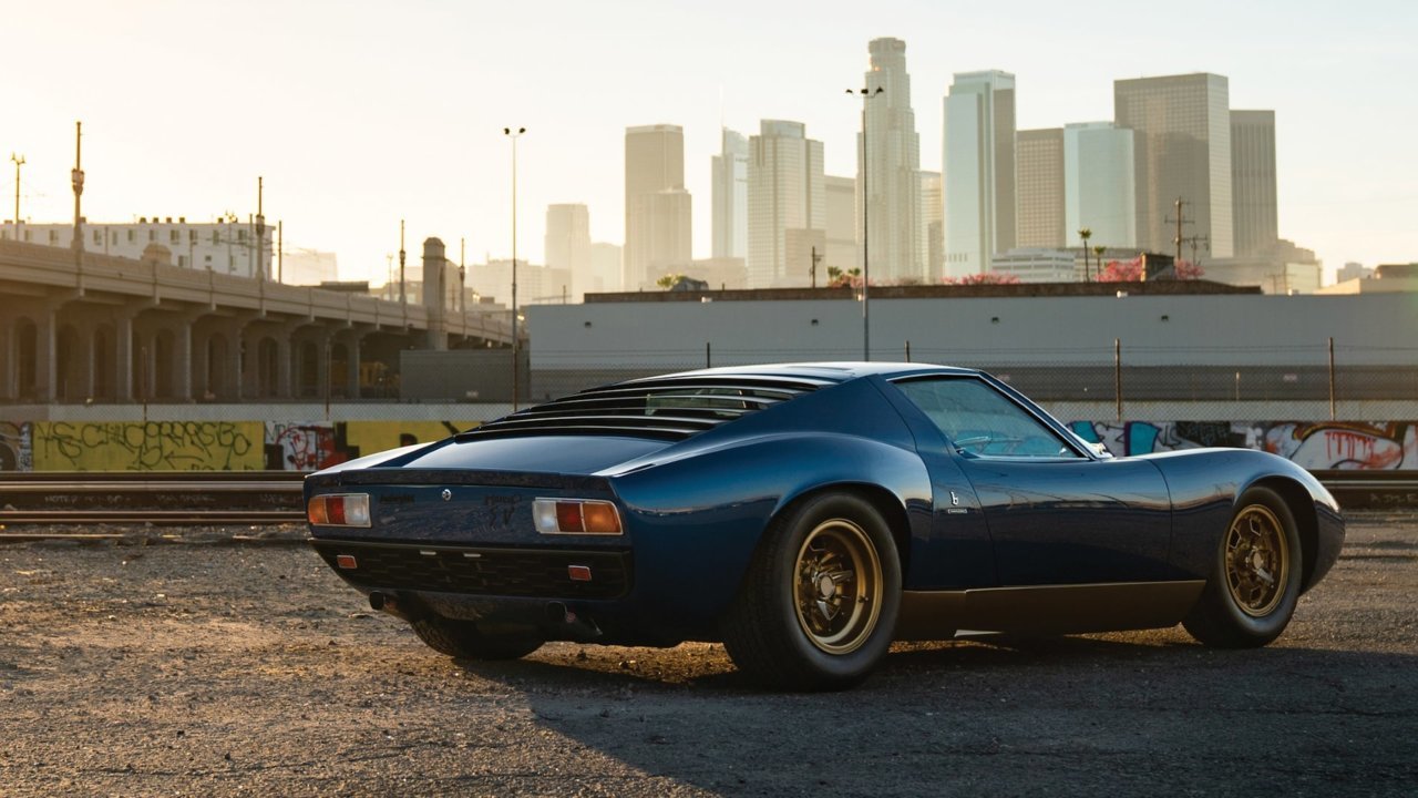 1971-Lamborghini-Miura-P400-SV-rear-thre_9fe8c1ee3195ec6c6bd05a06ccd52e06f4ea9939.jpg