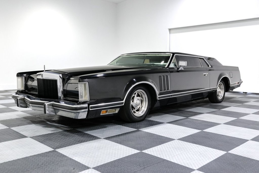1977-lincoln-mark-v-is-a-chop-top-monolith-it-sits-low-and-wide-and-rules-the-road-255705_1.jpg