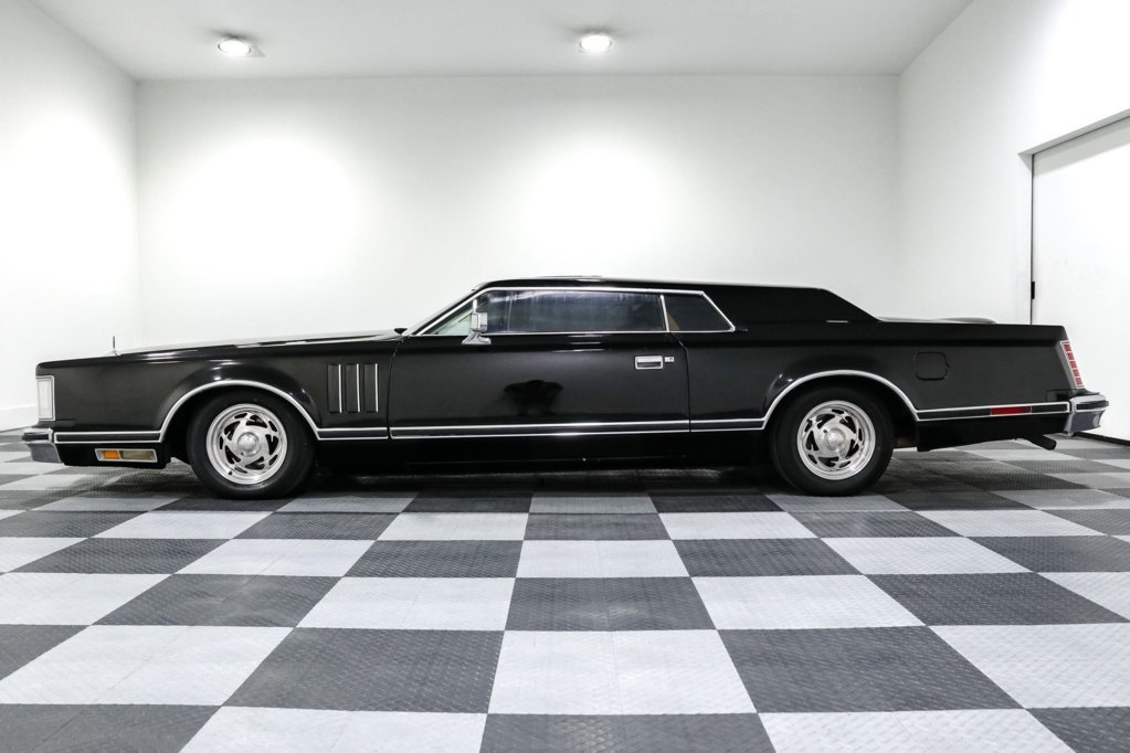1977-lincoln-mark-v-is-a-chop-top-monolith-it-sits-low-and-wide-and-rules-the-road_1.jpg