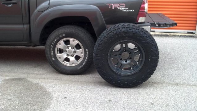 285/70r17 for comparison... big difference, lots of cutting to fit. 