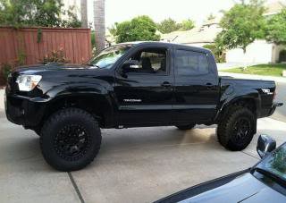 2013-lifted-toyota-tacoma-74p9ki8d_908eb0dd8a9a636d1c71628f627ebfdd86a7dd80.jpg