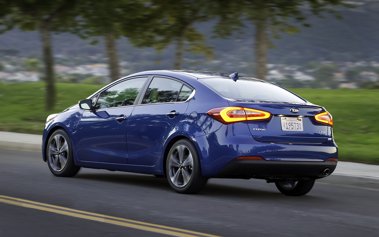 2014-kia-forte-sedan-rear-three-quarters_c339f6793cb116a2d52626245a7dab8747ec9927.jpg