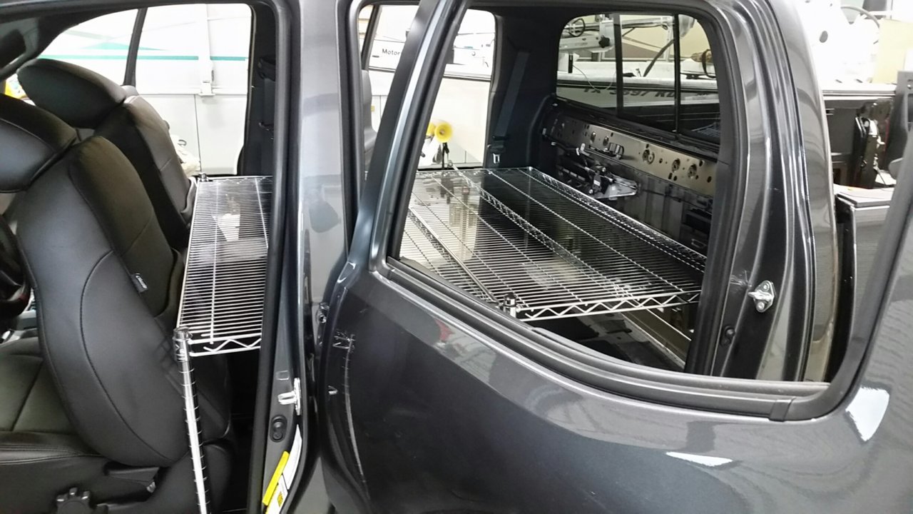 20181221 - Cab sleeping platform, 48W x 54L, (two 24x54 Metro Wire shelves), driver's side.jpg