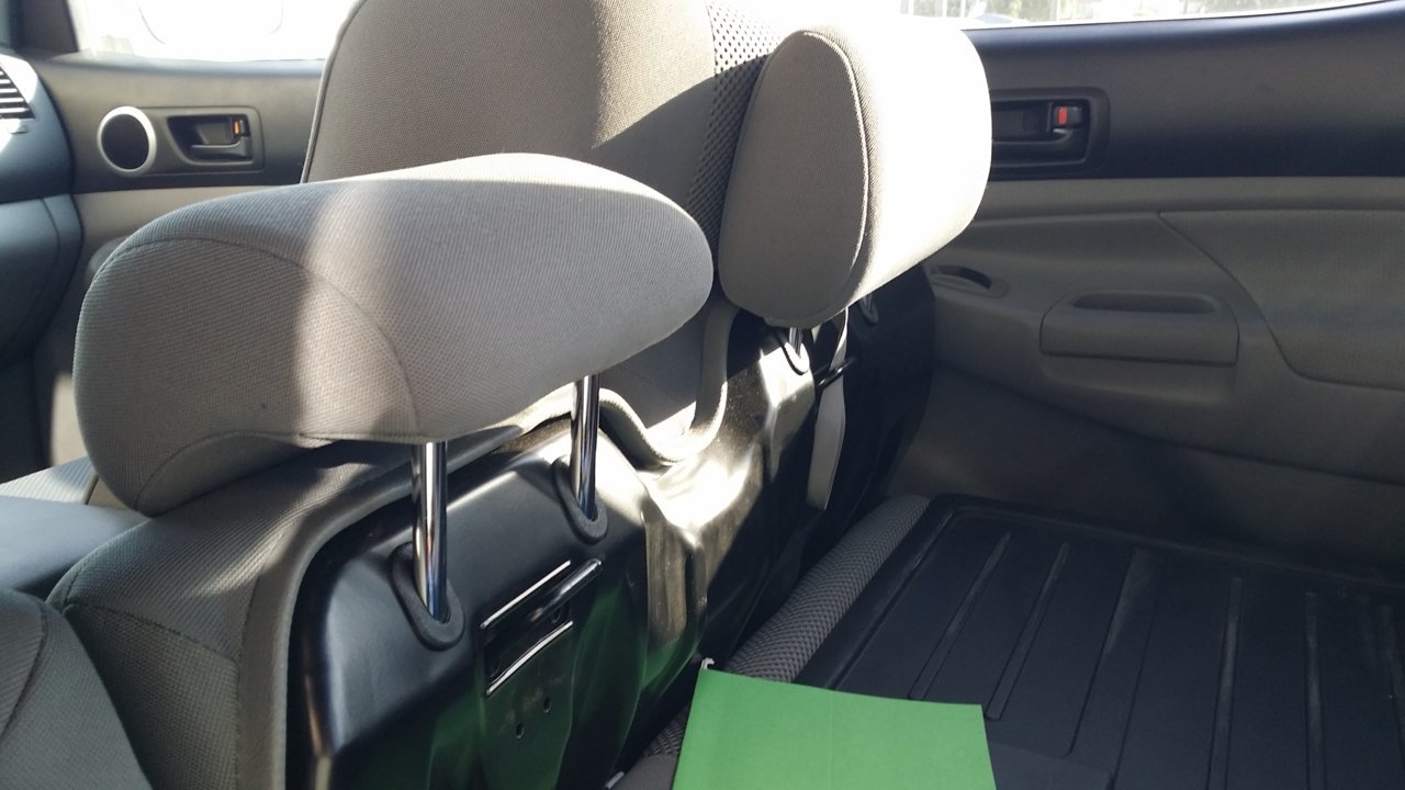 Rear seat head rest storage. Who knew