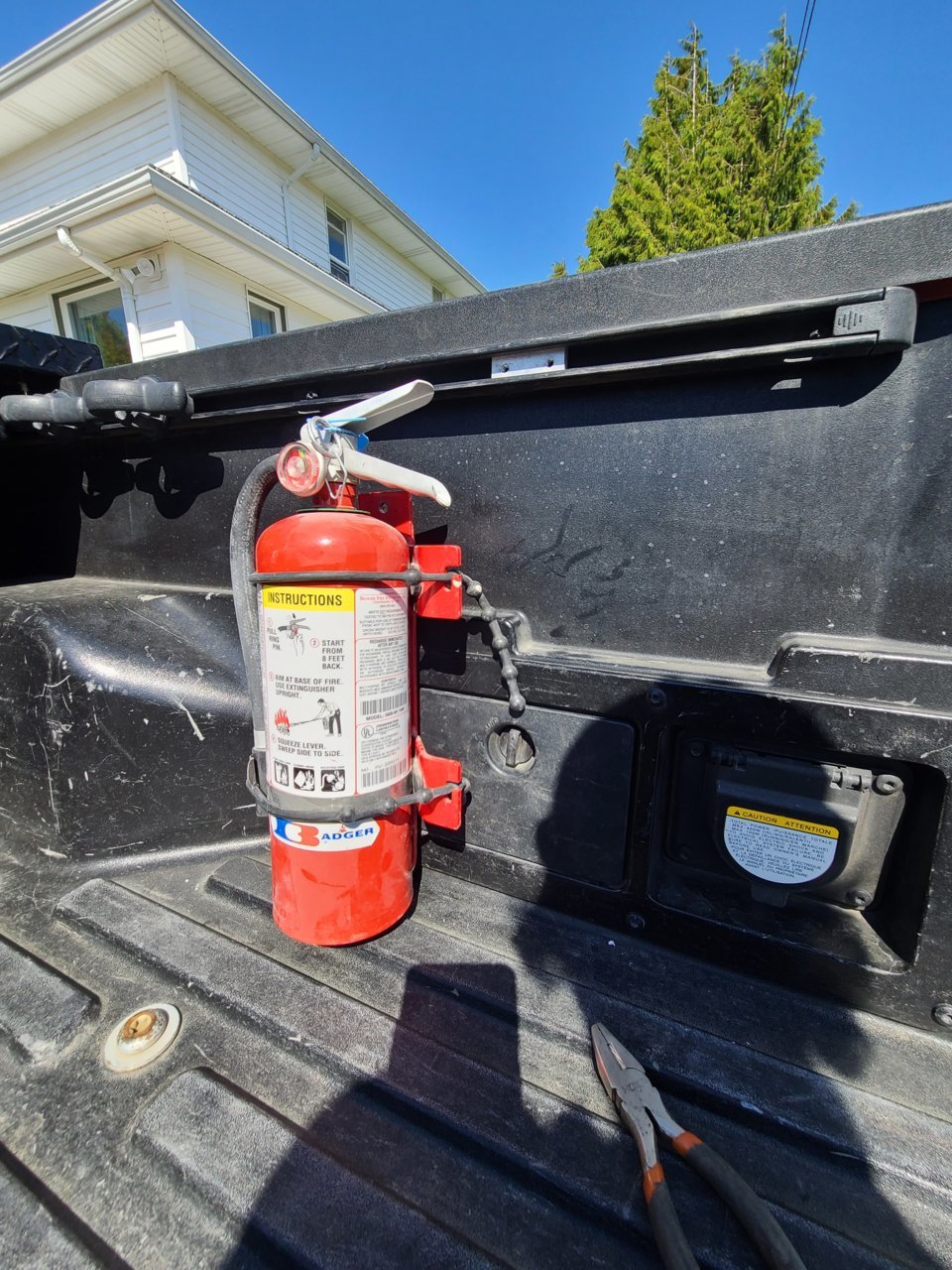 Truck fire clearance extinguisher