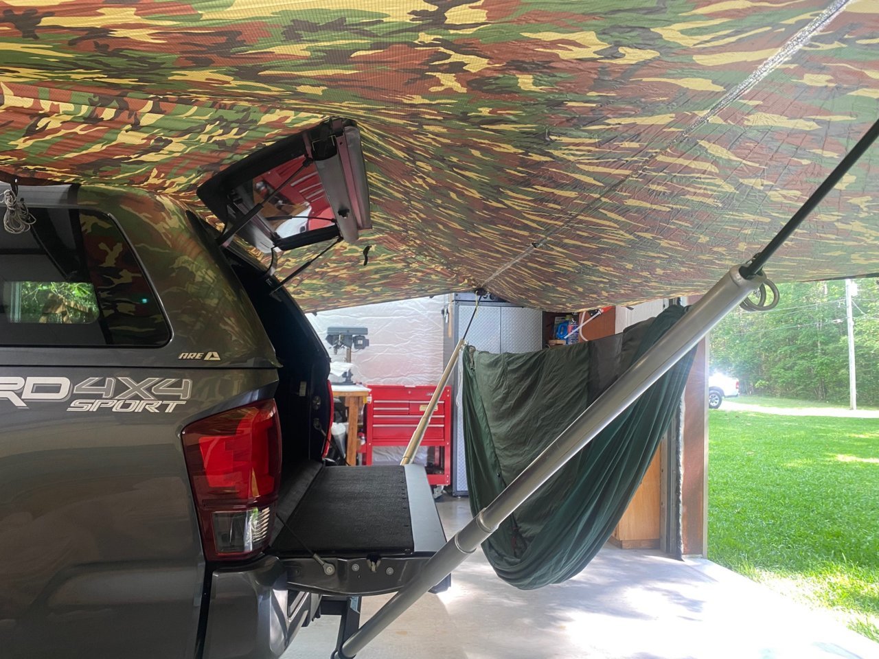 20220509 - Dream Hammock Sparrow on trailer hitch hammock stand under JRB 10x22 Univ Tarp.jpg