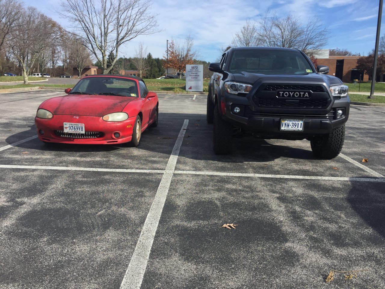 28_new_license_holder_next_to_miata.jpg