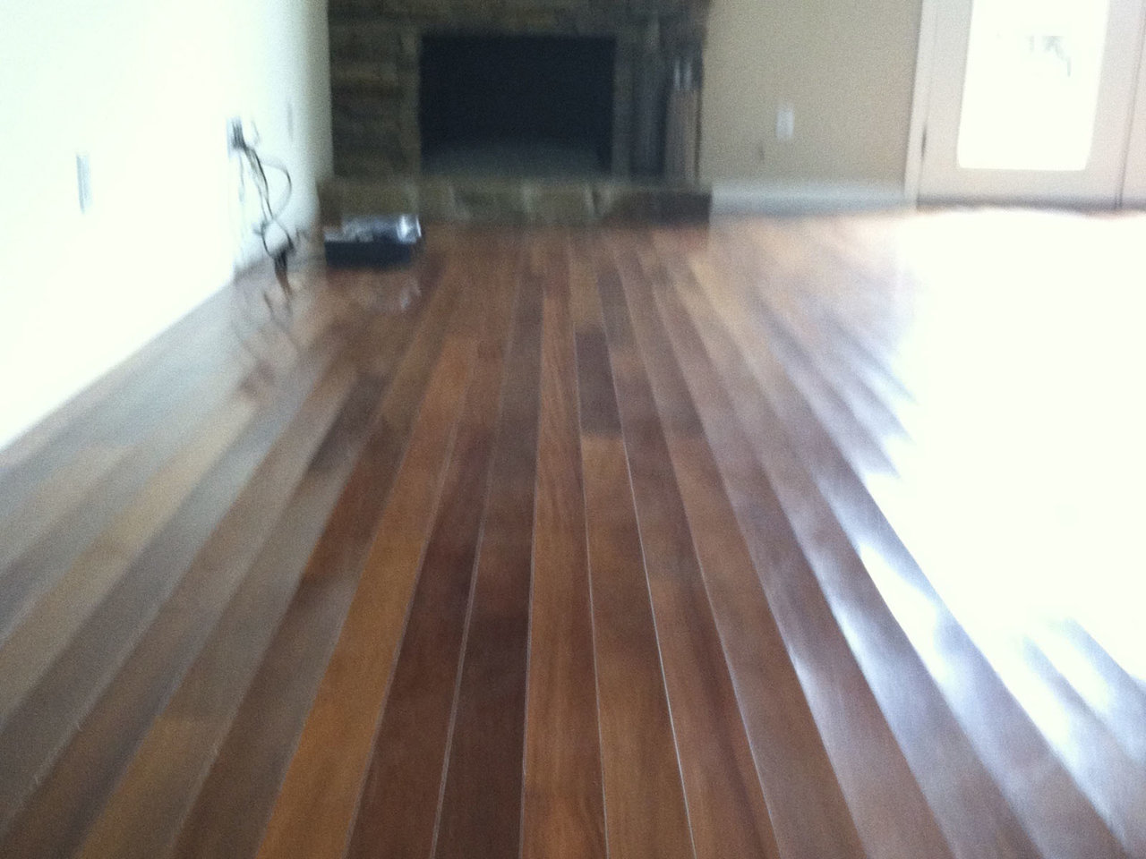 2_Before_Wood-Floor-Buckling-Prior-to-Refinishing.jpg