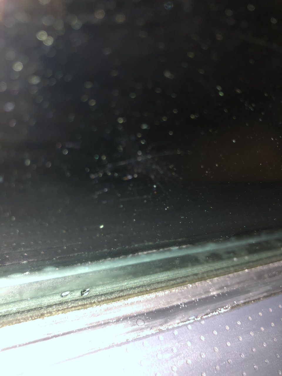 Scratched window. Buffing only made more scratches