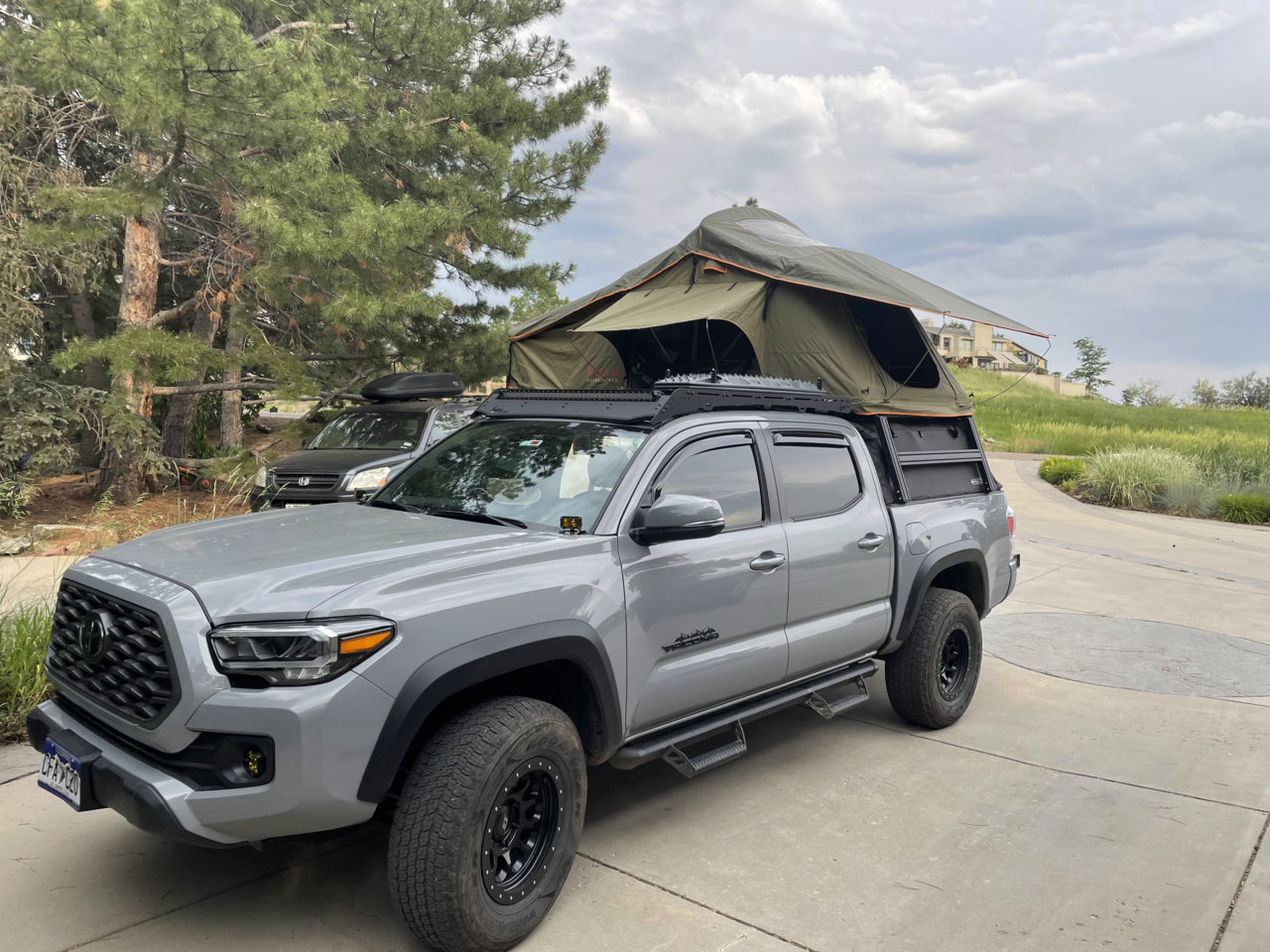 Rod vault and roof top tent help