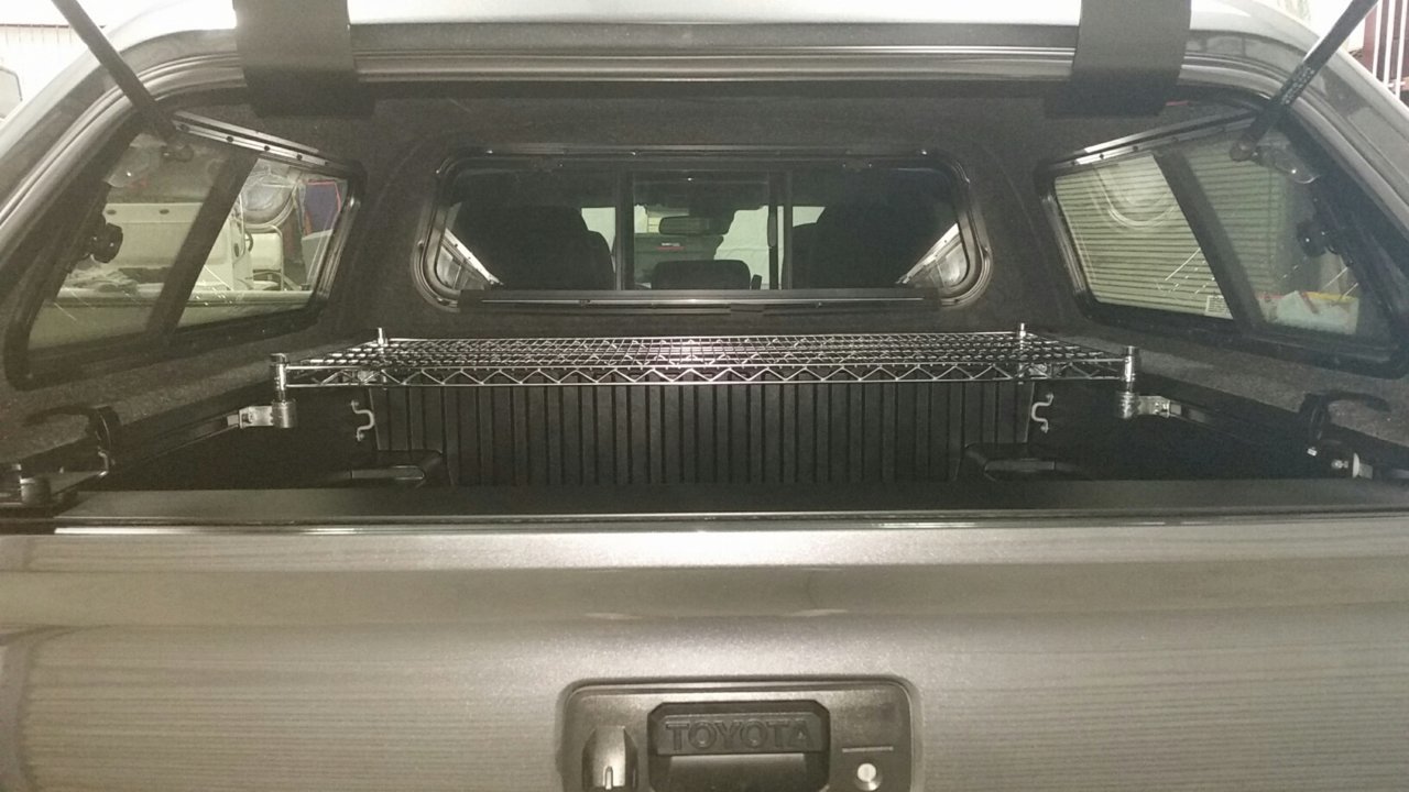 6000Btu AC secured to wire shelf, drains thru bed, blows into cab.jpg