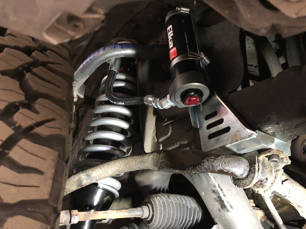 Adjusting coilovers without removing