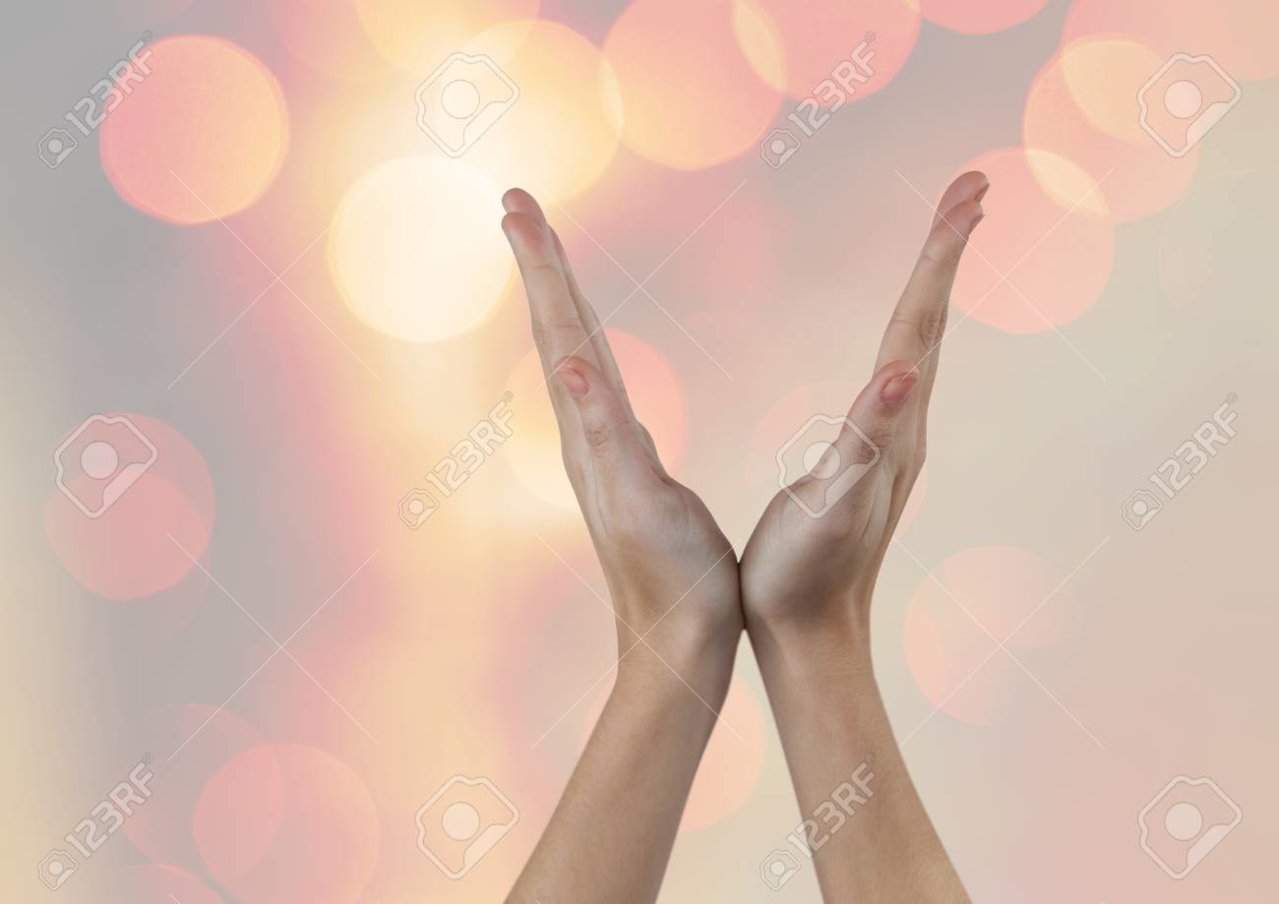 79252377-digital-composite-of-hands-in-v-shape-with-sparkling-light-bokeh-background.jpg