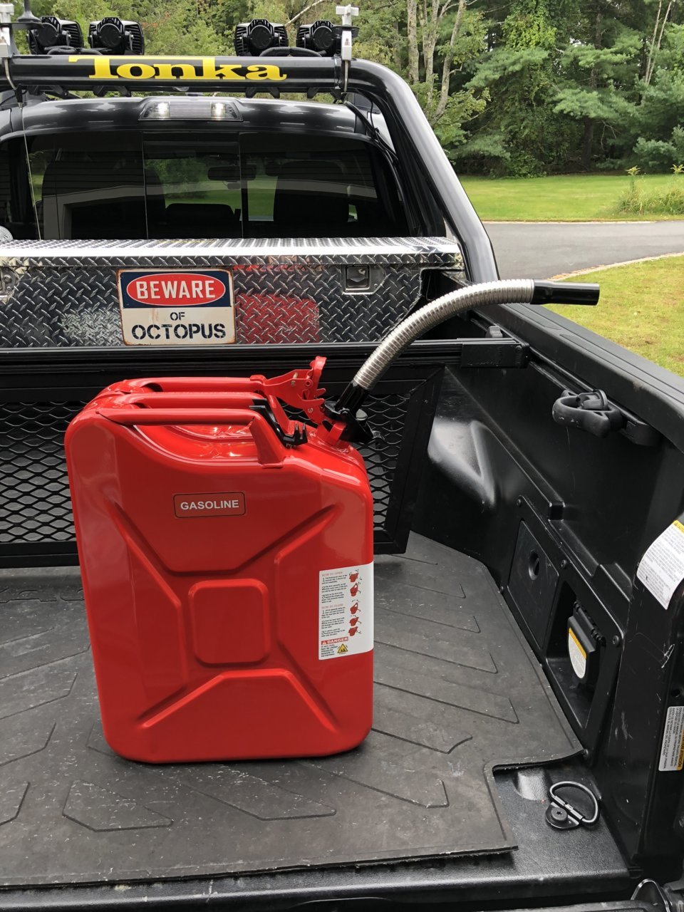 Gas can holder for truck online bed