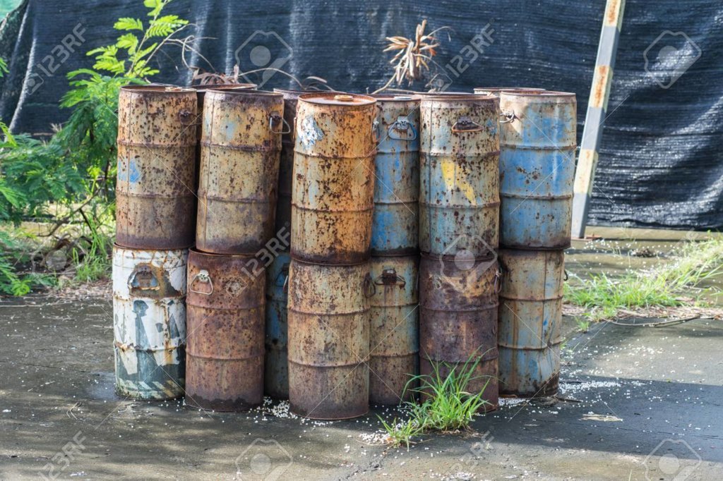 86755298-rust-metal-oil-barrel-in-junk-yard.jpg