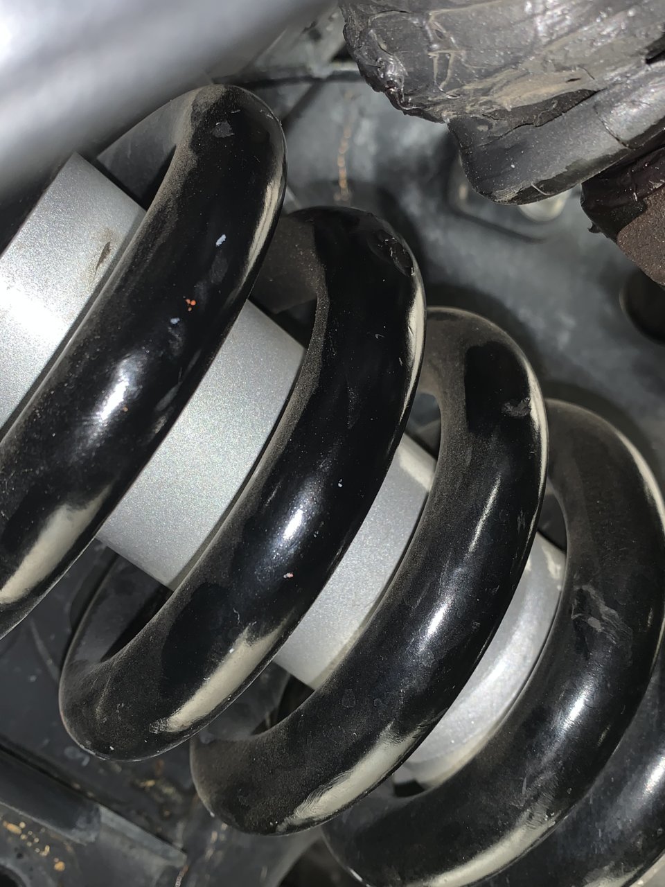 Upper ball joint hitting coil after new alignment | Tacoma World