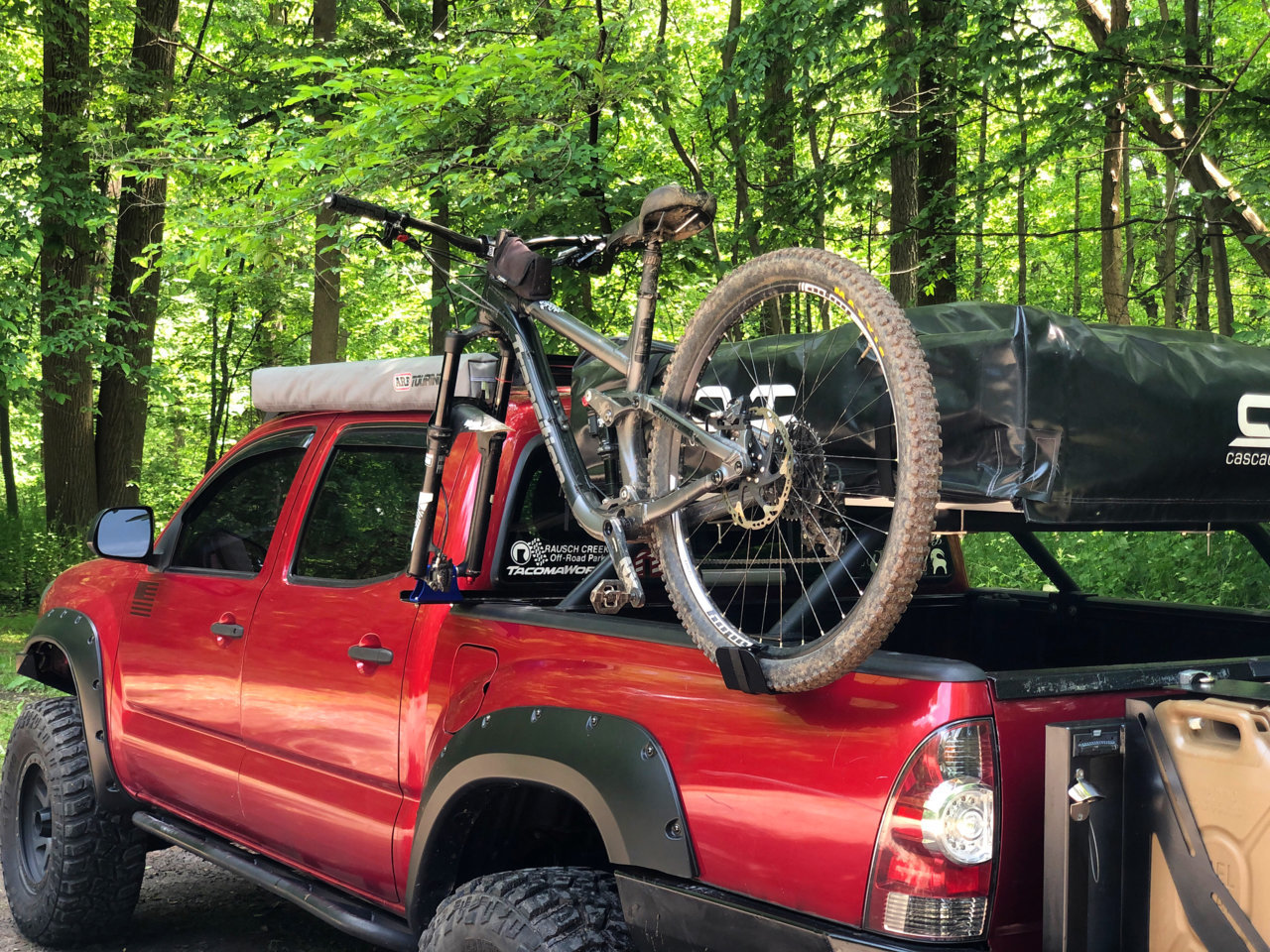 Truck bed side clearance bike mount