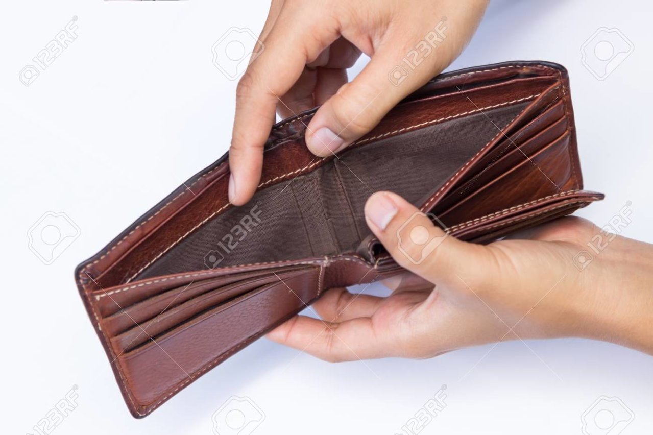 93471964-empty-wallet-in-man-s-hand-on-white-background-.jpg
