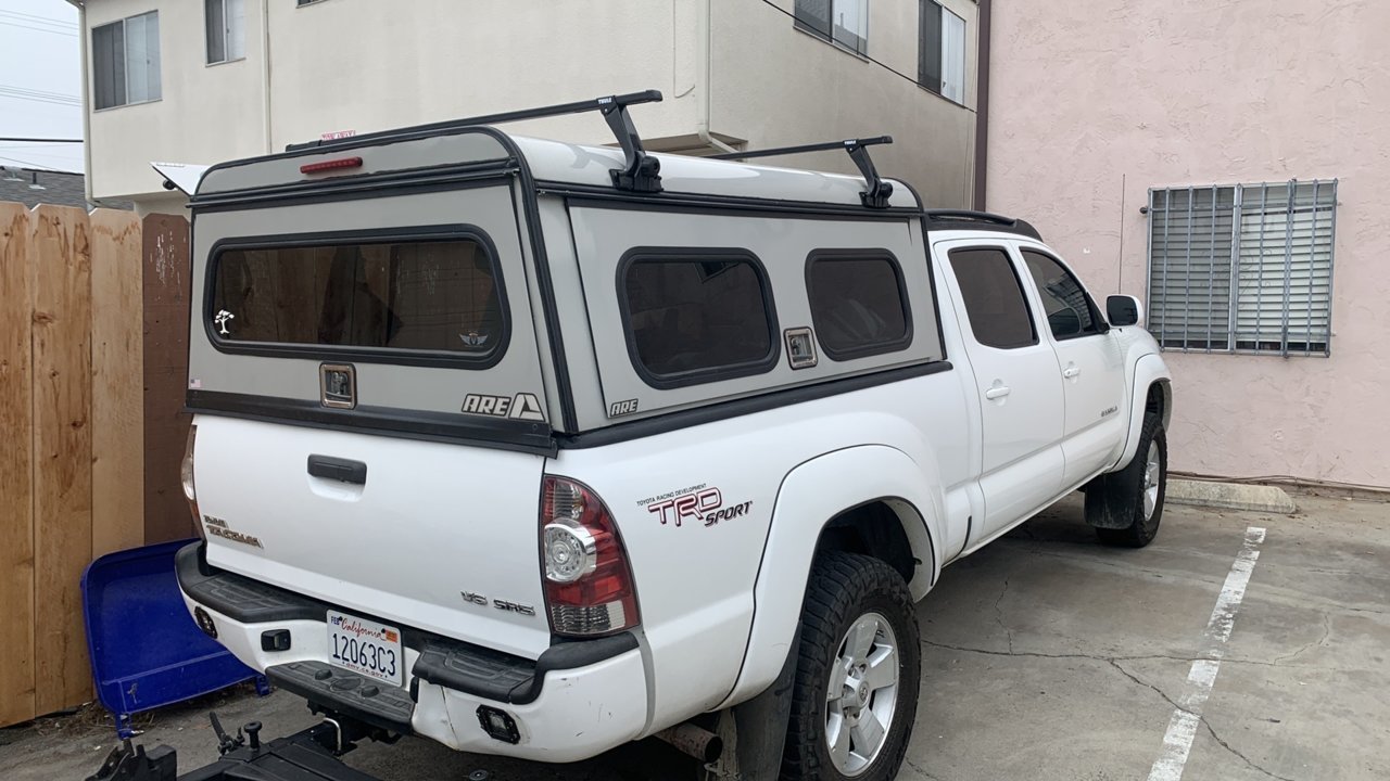 ARE DCU camper shell with roof rack and bed kit for sale | Tacoma World