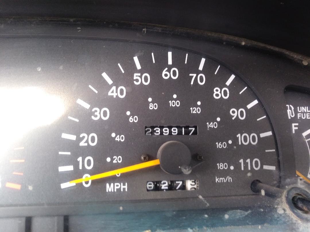 97 v6 salvage odometer.jpg