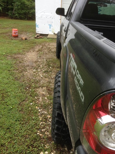 a Tire Stickout Drivers From Rear.jpg