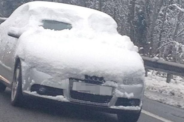 Acardrivingontheroadwhilstcoveredinsnoww_8bf295ff9930b4dc064eaafb75a72bf2277a50c5.jpg