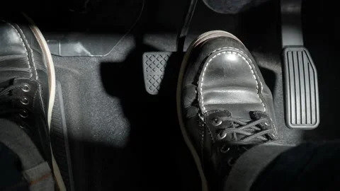 accelerate-and-brake-foot-pressing-footage-169383804_iconl.jpg