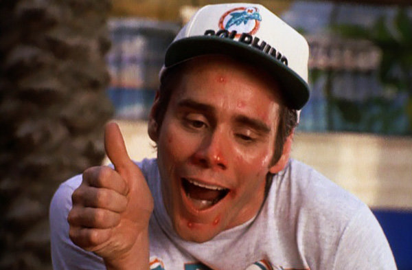 ace-ventura-pet-detective-dolphin-kid-signing-pimples-jim-carrey.jpg