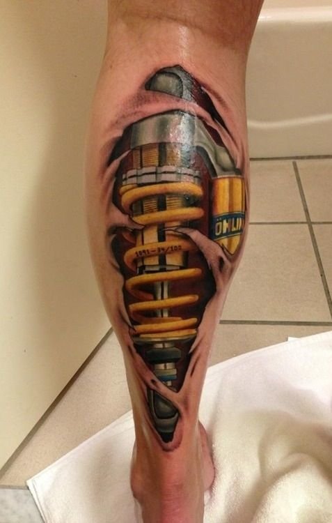 Amazing-Shock-Absorber-Tattoo-On-Left-Leg.jpg
