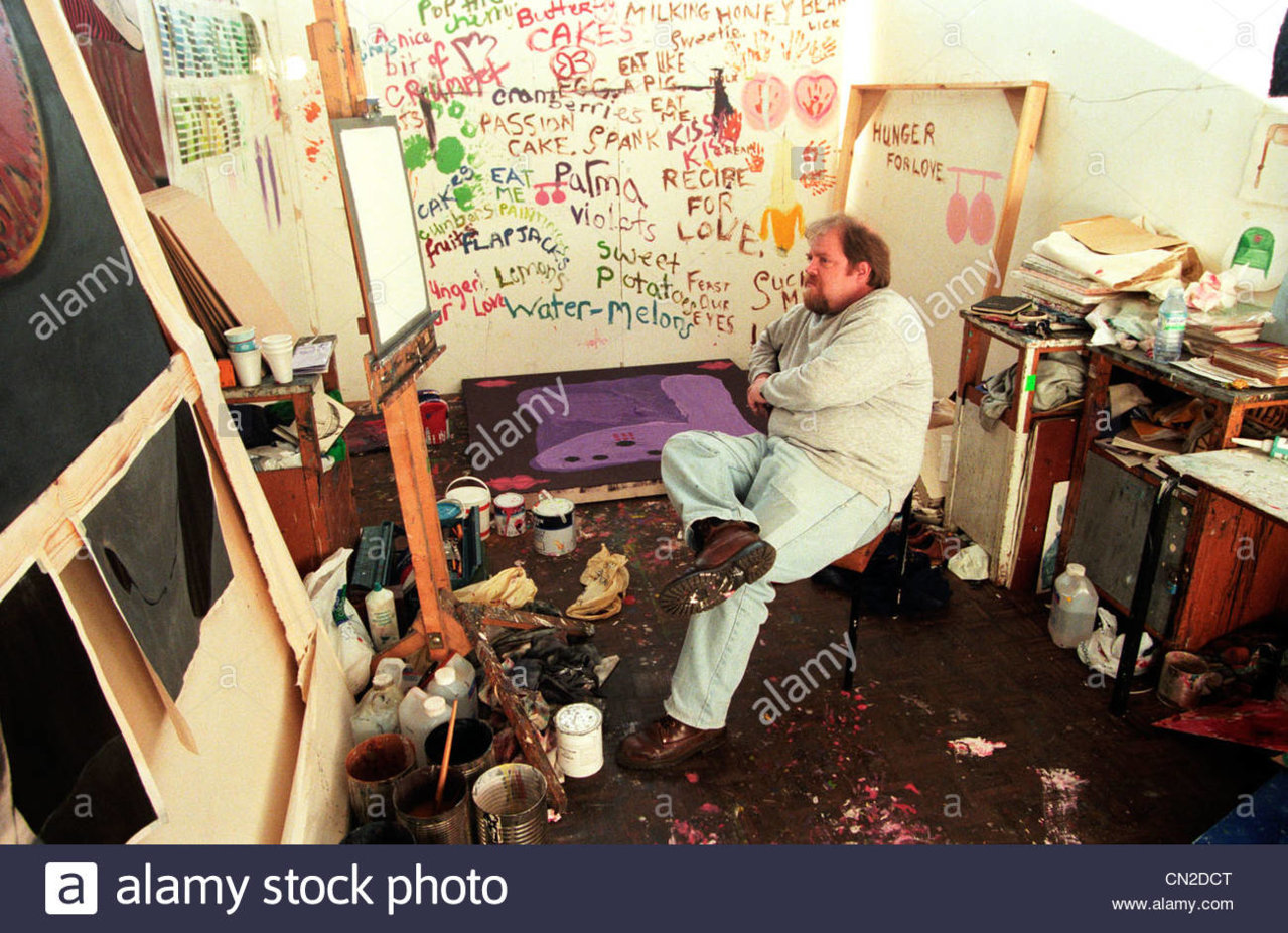 an-overweight-artist-looking-at-a-blank-canvas-in-a-messy-studio-with-CN2DCT.jpg