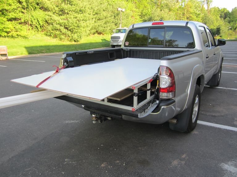 bed extender carrying plywood.jpg