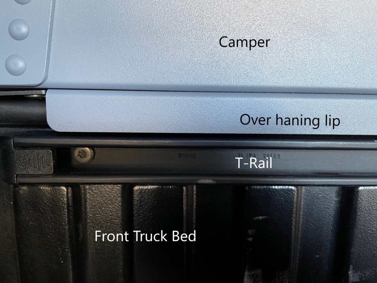 Bed Front and Camper Lip+T-Rail.jpg