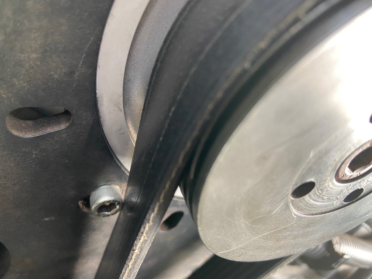 belt contact with mounting bolt 1.jpg