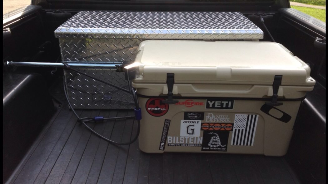 Roadie 60 fits under the bed cover : r/YetiCoolers