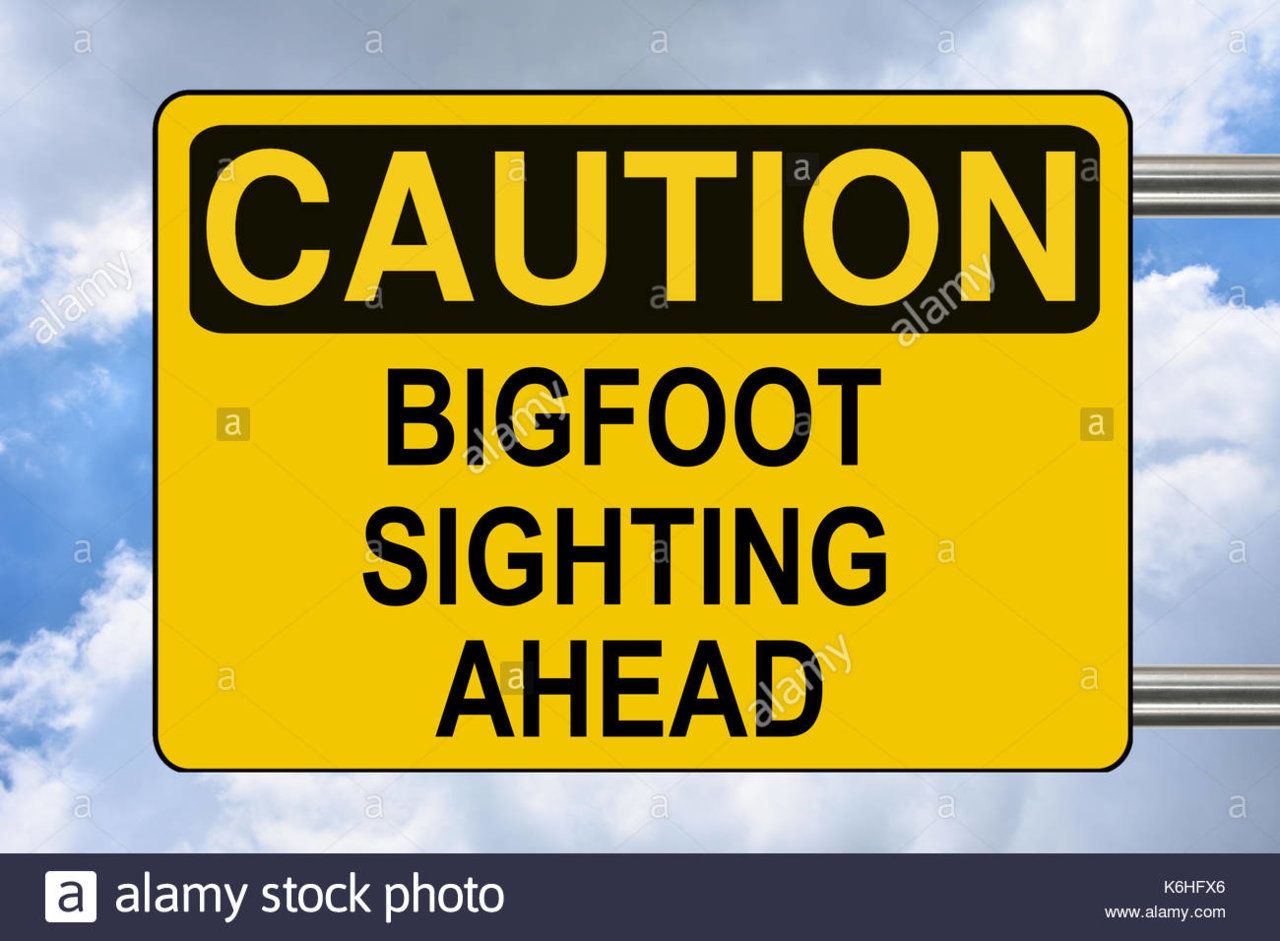 bigfoot-sighting-ahead-yellow-warning-road-sign-K6HFX6.jpg