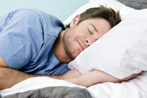 bigstock-Man-comfortably-sleeping-in-hi-15694625-300x200.jpg
