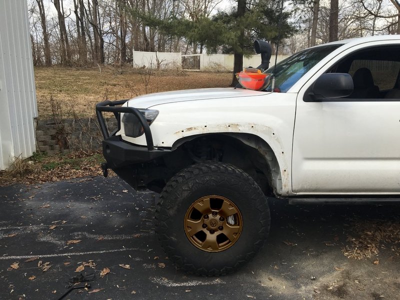Bronze Stock Wheel with 35 Tire.jpg