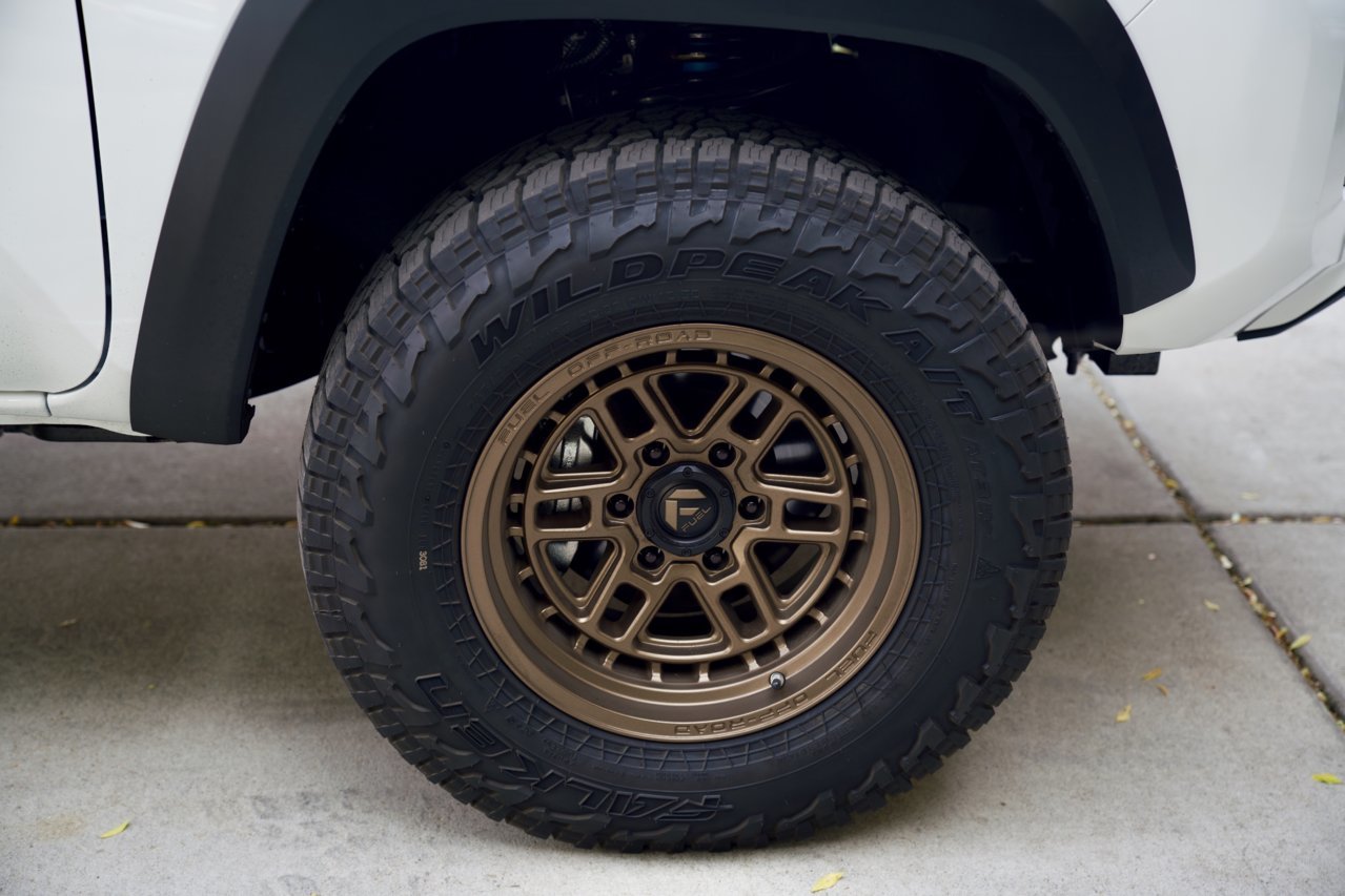 Anyone have pictures of bronze rims on their super white? | Tacoma World