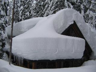 cabin+buried+in+snow.jpg