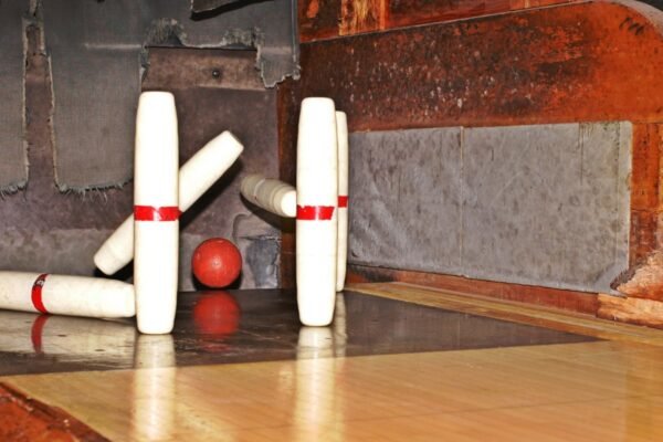 candlepin-bowling-ball-hitting-pins-600x400.jpg