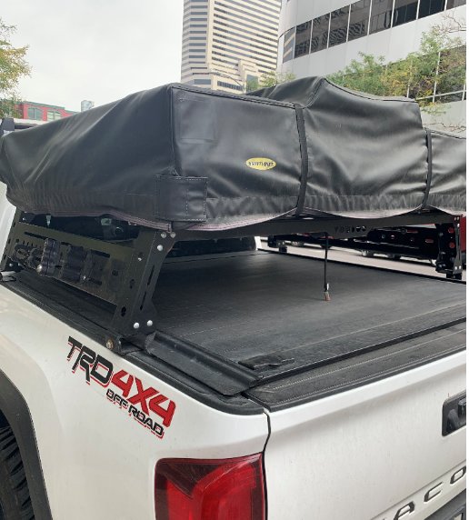 How can I put a tonneau cover as well as a high bed rack Tacoma