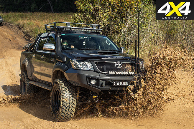 custom-toyota-hilux-sr5-driving-mud.jpg