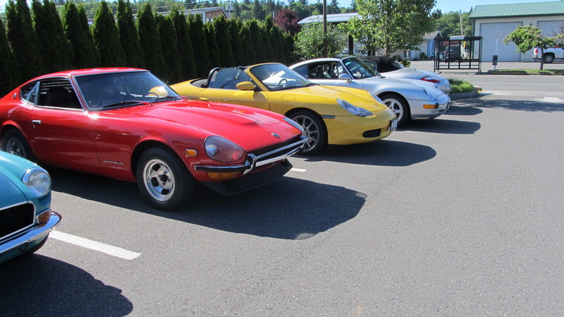 Datsun 260 & Some Porsches.jpg